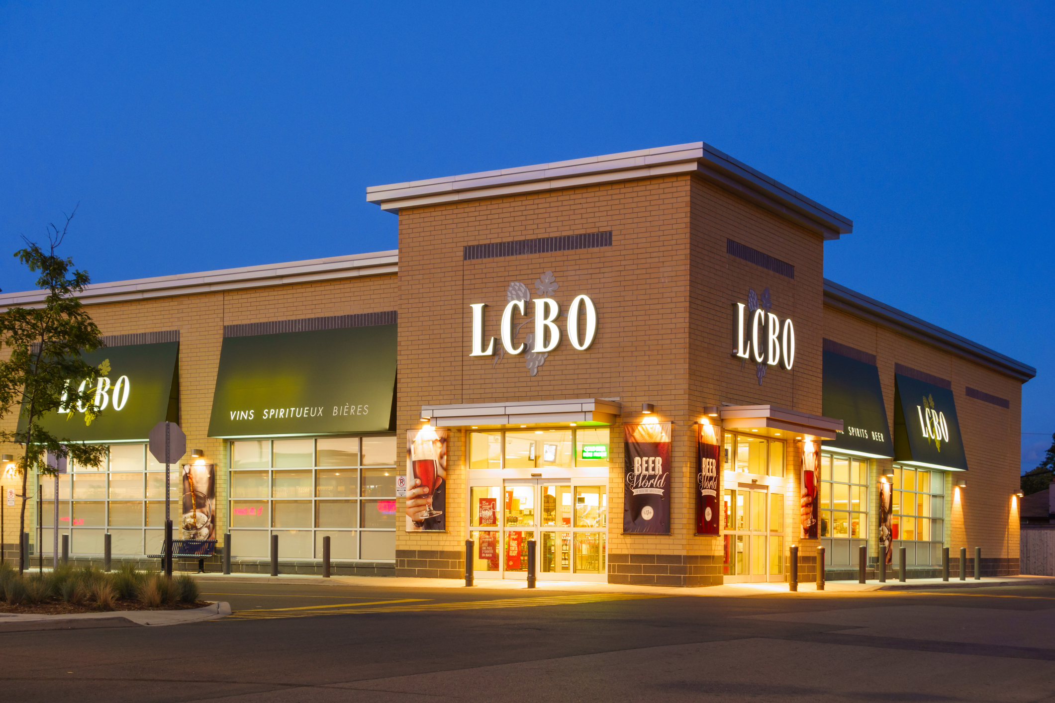 Hamilton, Canada - August 14, 2013: Liquor Control Board of Ontario (LCBO) store illuminated in the evening in Hamilton, Ontario.